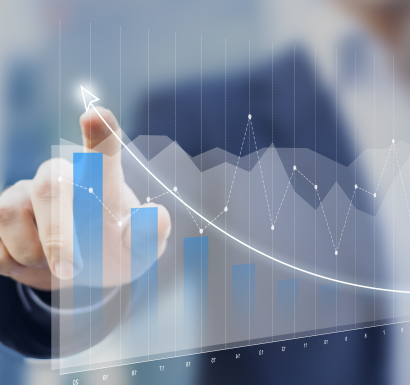 A businessman confidently points at a graph on a business chart, showcasing his expertise in analyzing data and making informed decisions.